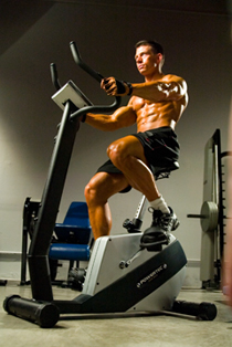 Jonathan on stationary bike - More Key Fat-to-Muscle Tips