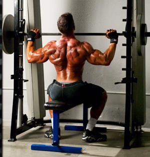 Jonathan Lawson shoulder presses - Two Moves for More Mass