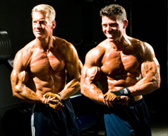 Steve Holman and Jonathan Lawson flexing - Cheat to Get Ripped