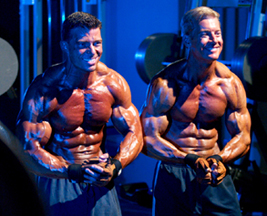 Jonathan Lawson and Steve Holman flexing - New Size With Full-Body One-Hit Mass Workouts