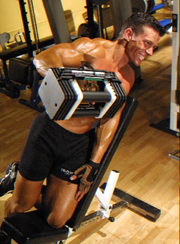 Incline one-arm lateral raise finish