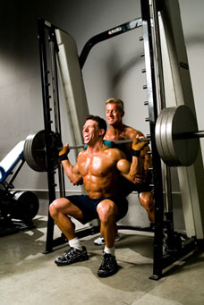 Steve spotting Jonathan on Smith machine squats - Max Force for Major Muscle