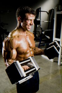 Jonathan doing dumbell curls with Powerblocks