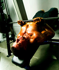 Jonathan Lawson; decline, close-grip bench presses to synergize for triceps size