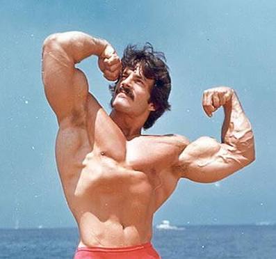 Mike Mentzer on a beach in Australia, cropped