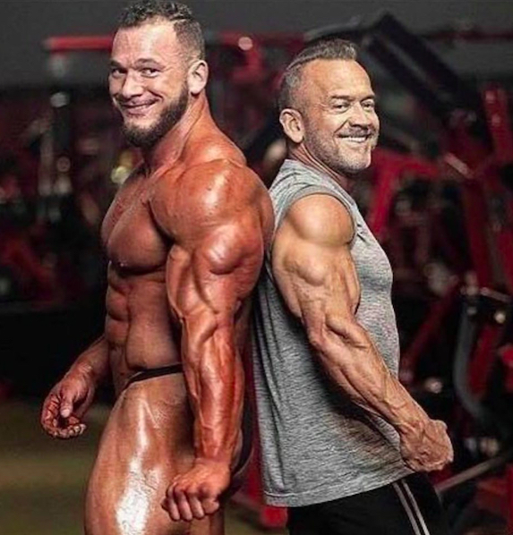 Lee Labrada and Hunter showing their arms