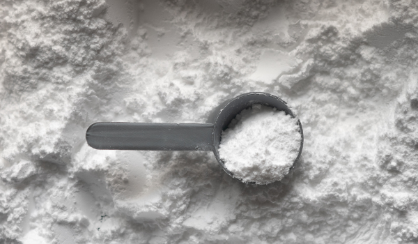 Powder with scoop, Top 4 Muscle-Size Nutrients