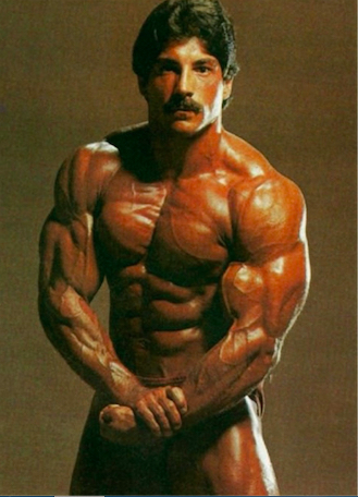 Ray Mentzer in a most-muscular pose, in studio