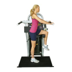 Woman on hip flexion machine