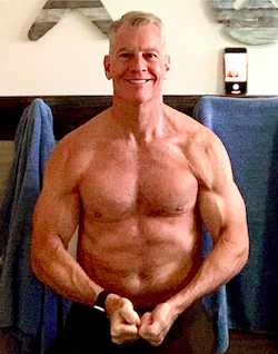 Steve posing in his bathroom at 62