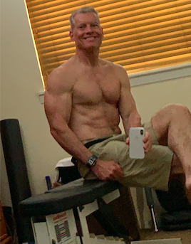 Steve taking a selfie in his home gym