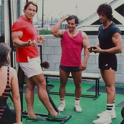 Arnold, Franco, and Stallone at an outdoor gym