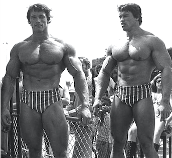 Two pics of arnold looking massive, striped trunks, black and white pic
