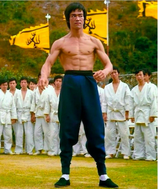 Bruce Lee ready to fight with ripped abs