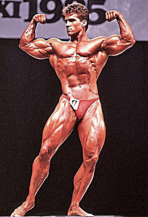 Bob Paris in a double biceps pose at the 1995 Mr. Olympia