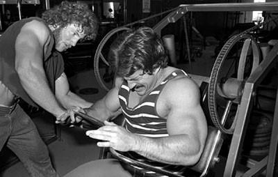 Mike Mentzer doing a forced rep on a Nautilus pullover machine