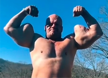 Some man with ridiculous synthol biceps