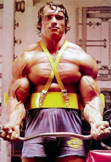 Arnold using a biceps blaster at his peak