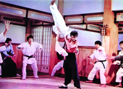 Bruce Lee in a karate school fight (from a movie)