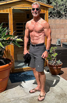 Full-body pic of Steve outside of his sauna