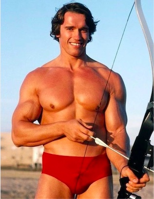 Arnold in the off-season with a bow and arrow