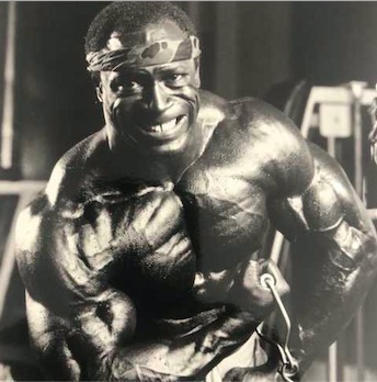 Lee Haney doing cable concentration curls