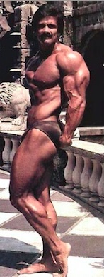 Frank Calta in a side triceps pose outside
