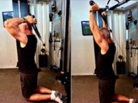 Steve demonstrating cable overhead triceps extensions